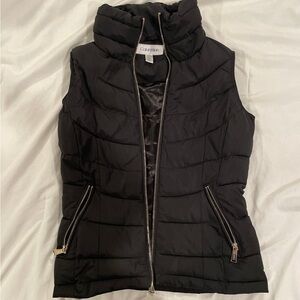 Calvin Klein size XS vest, form fitting in great condition